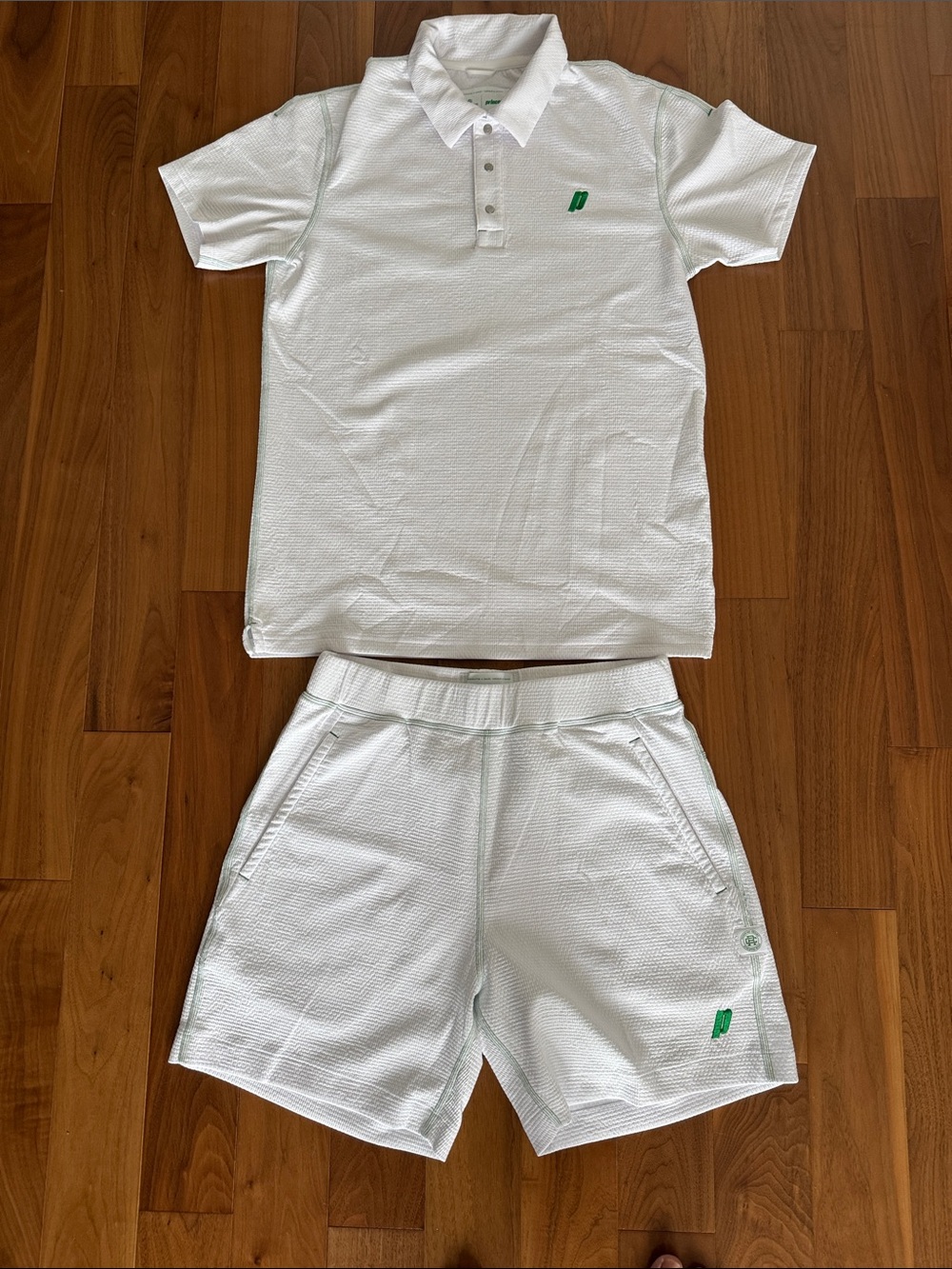 Reigning Champ White Men's Athletic Shorts with Green Logo